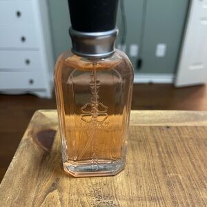 Lucky Brand Fragrance Bottle with Orange Tint